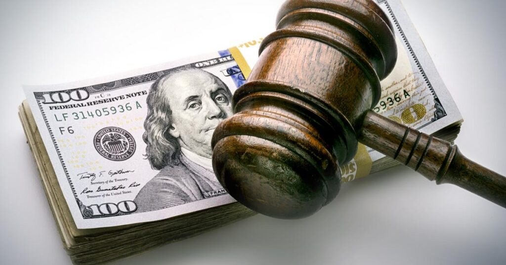 Gettyimages judges gavel and stack of money credit to atu images